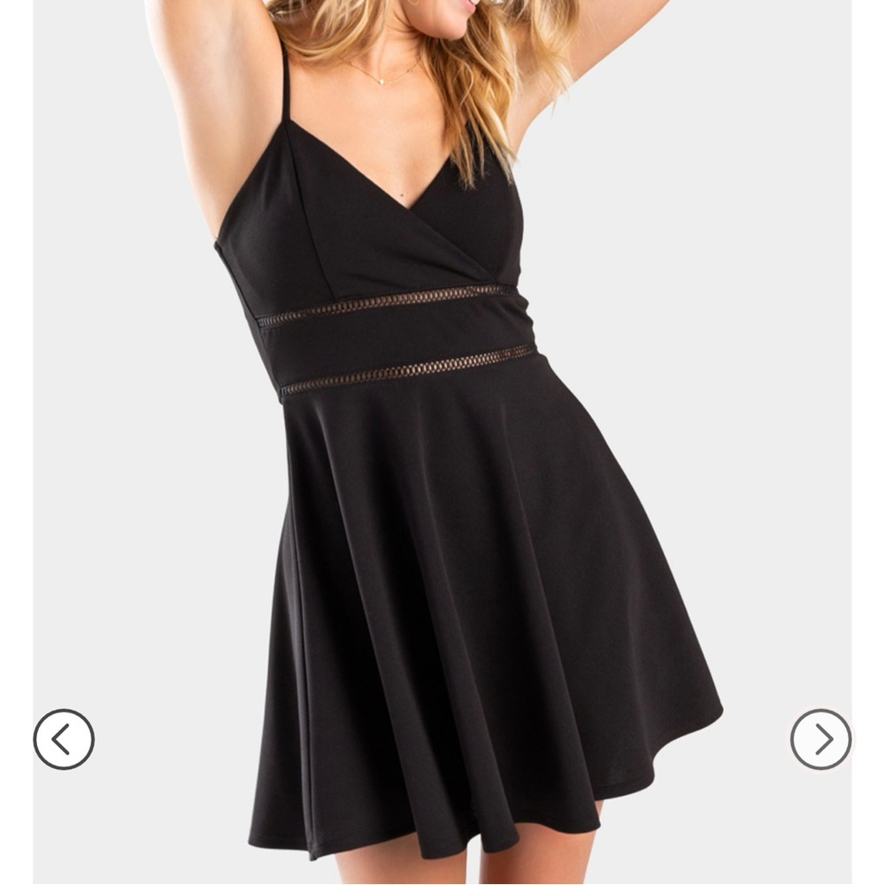 Francesca’s black skater dress with ladder trim cutout